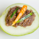 Shrimp paste on a slice of green mango (Photo: olovedog/Getty Images)